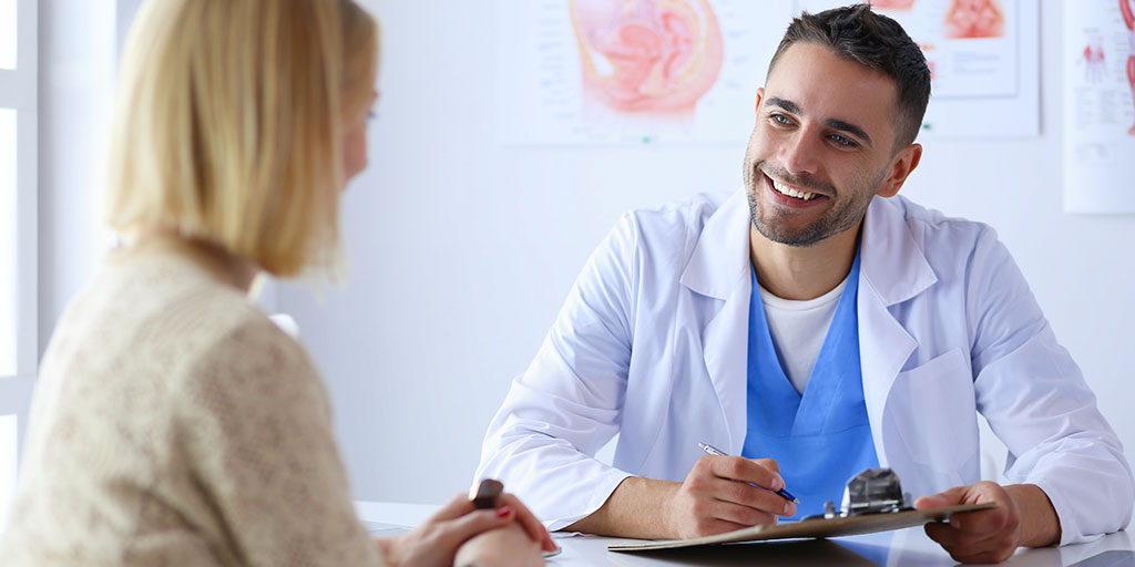 Woman talking with a plastic surgeon