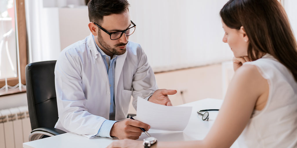 Doctor talking to patient